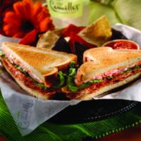 Classic BLT Sandwich · A classic bacon, lettuce and sliced tomato on your choice of bread. Served with tri-colored ...