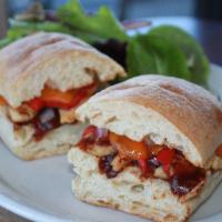 BBQ Chicken Chipotle · Ciabatta bread, grilled chicken, chipotle bbq sauce, roasted red peppers, red onions and che...