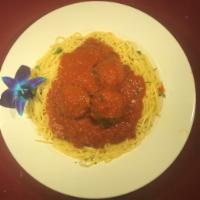 Spaghetti with Meatballs · Tomato sauce, Parmesan cheese, served with a mixed garden salad with house vinaigrette dress...