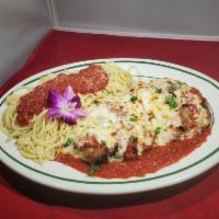 Veal Parmesan with Spaghetti · Veal patty, tomato sauce, cheese, served with a mixed garden salad with house vinaigrette dr...