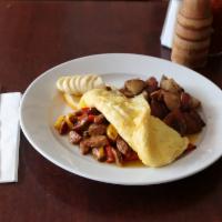 New Orleans Omelette  · 2 farm-fresh organic eggs, Cajun sausage, yellow and red bell peppers, cheddar cheese and op...