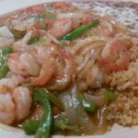 Camarones Rancheros · Prawns served with bell peppers, onion and tomatoes in a special ranchero sauce.