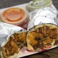 Burrito · Beans, rice, cheese and your choice of meat rolled in a 12'' tortilla.