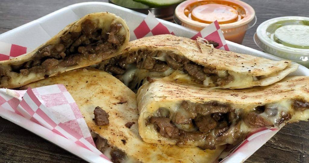 Quesadilla · 12'' Flour tortilla, cheese and your choice of meat. Onion and cilantro upon request.  Add side avocado and side sour cream for an additional charge.