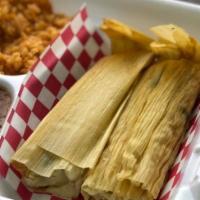 2 Tamales Platter · 2 tamales, pork or chicken served with rice & beans.