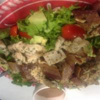 Classic Cobb Salad · Romaine lettuce, grape tomatoes, crisp bacon, hard-boiled eggs, warm grilled chicken and avo...