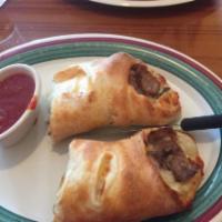 Sausage Roll · Crispy dough filled with minced vegetables.