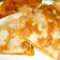 Cheese Quesadillas · Served with sour cream and taco sauces. 

