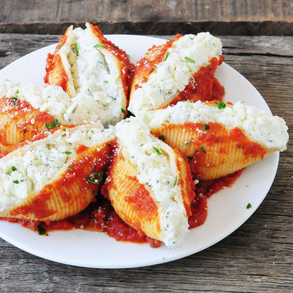 Cheese Stuffed Shells Parmigiana · Cheese stuffed shells with our famous marinara suace baked with mozerella cheese (side of Italian bread)