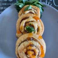 Neese's Sausage Roll · Wrapped with creascent roll into a perfect twirl. 