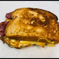 Bacon, Egg and Cheese Melt Sandwich · Off gril. Hot sandwich with cheese and protein.