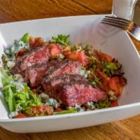 Grilled Steak Salad  · Mixed greens with Danish blue cheese, tomatoes, bacon and a Dijon vinaigrette.