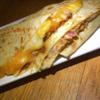 Quesadilla · Flour tortilla filled with protein of your choice, cheddar,
and mozzarella cheese.
Sour cr...