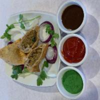 Meat Samosa · Lamb. Crispy triangular pastry turnovers filled with minced lamb seasoned with potatoes and ...