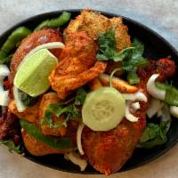 Special Tandoori Mix Grill · Combination platter of tandoori (chicken, shrimp, fish, and lamb).