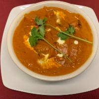 Chicken makhani ( butter chicken) · Pulled chicken cooked in Tandoor ( clay oven) and sautéed in special buttery tomato and crea...
