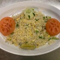11. Egg Fried Rice · Rice cooked with eggs and garden-fresh vegetables with soy sauce.