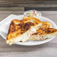 Tuna Melt Sandwich · Albacore tuna salad with a generous amount of white cheddar cheese. Served on hand sliced ru...