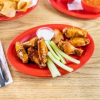 1 lb. Spicy Chipotle Lime Wings · Cooked wing of a chicken coated in sauce or seasoning.