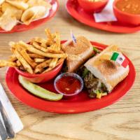 Mexican Fajita Cheese Steak Sandwich · Grilled onions and peppers with steak served on a tortilla.