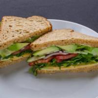 Avocado Cucumber Veggie Sandwich · Avocado, thin sliced cucumber, lettuce, tomato, and mayo with your choice of Swiss, cheddar,...