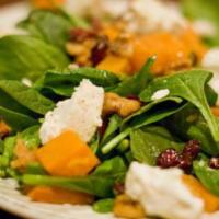 Nestico's Signature Spinach Salad · Spinach, butternut squash, toasted walnuts, dried cranberries, and goat cheese. Drizzled wit...