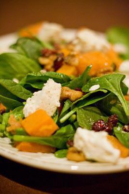 Nestico's Signature Spinach Salad · Spinach, butternut squash, toasted walnuts, dried cranberries, and goat cheese. Drizzled with olive oil.