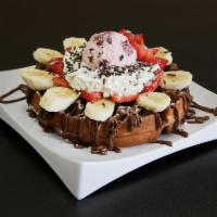 7. Mango Waffle · Strawberries, banana, nutella and chantilly.