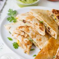 Grilled Chicken Quesadilla  · Served with guacamole, salsa and sour cream.