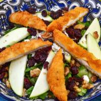 Crunchy  Salad · Romaine lettuce, dried cranberries, granny smith apples, toasted walnuts and crumbled blue c...