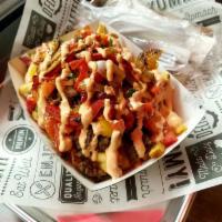 Fajita Loaded Fries · Chive fries, cheese sauce, grilled steak, fresh pico, grilled fajita peppers and onions and ...
