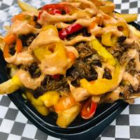 Loaded Pork Fries · Chive fries, braised pork, cheese sauce, pickled sweet and spicy peppers, bacon crumbled and...