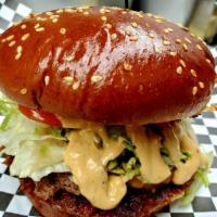 MKE Burger · Burger, cheddar cheese, bacon jam, lettuce, tomato, burger sauce served on a sesame seeded b...
