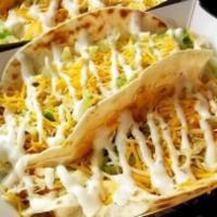 Buffalo Chicken Taco · Grilled chicken, Buffalo sauce, lettuce, cheddar Jack and ranch.