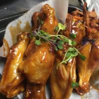 Hellacious Dinner · 24 piece wing dings with choice of 4 sides, 2 Hawaiian rolls and 2 sodas.