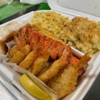 The Lobster Mobster · 6 oz. fried fresh water lobster tail, paired with golden fried shrimp. Choice of 2 sides and...