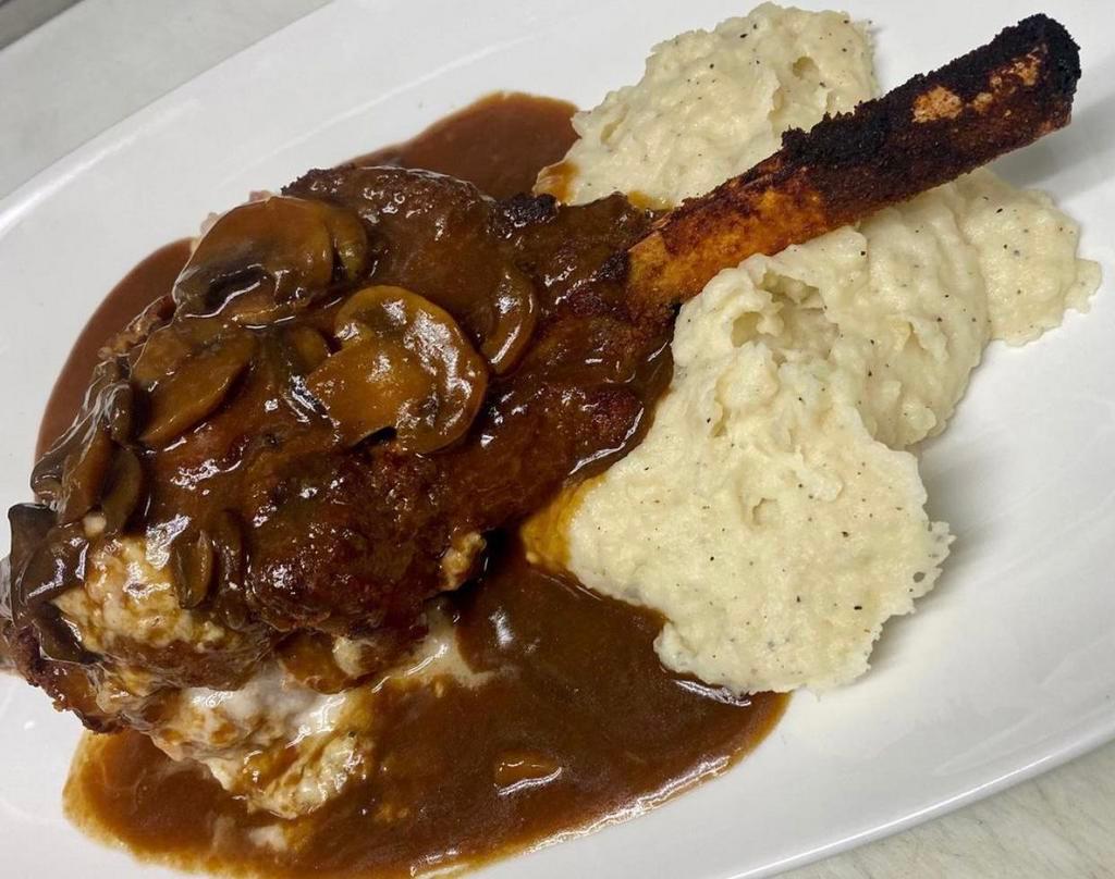 16 oz. Stuffed Veal Chop  · 16oz breaded veal chop, stuffed with prosciutto and fresh mozzarella. Served over mashed potatoes topped with a brown mushroom Marsala sauce.
