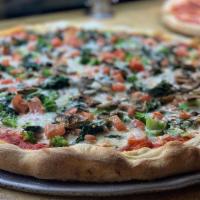 Vegetarian Pizza · Fresh spinach, fresh mushrooms, fresh broccoli, fresh tomatoes, tomato sauce and mozzarella.