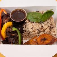 Original Jerk Pan Chicken Individual Jerk Box · Served with Jamaican hardo bread.