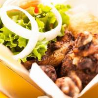 Original Jerk Pan Chicken Tenders Individual Jerk Box · Served with Jamaican hardo bread.