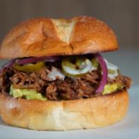 Sloppy Jose · Pulled BBQ Brisket, Guacamole, Crema, Pickled Jalapenos, Pickled Onions.