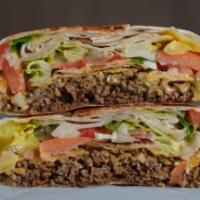CrunchWrap Supreme · Taco Ground Beef, Crunchy Tortilla, Vegas Cheddar, Crema, Lettuce, Tomato