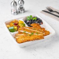 Schnitzel Plate · Crispy fried Schnitzel That Comes Over White Rice, With Your Choice Of 2 Sides.