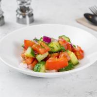 Side Of Israeli Salad · Cucumber, Tomato, Red Onions, Cilantro, Lemon Juice.