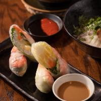Vietnamese Summer Rolls · lettuce, carrot, mango, rice vermicelli cold noodles, mint & Thai basil leaf, and poached ti...