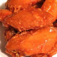 A19. Buffalo Wing · Cooked wing WITH SPICY BUFFALO SAUCE