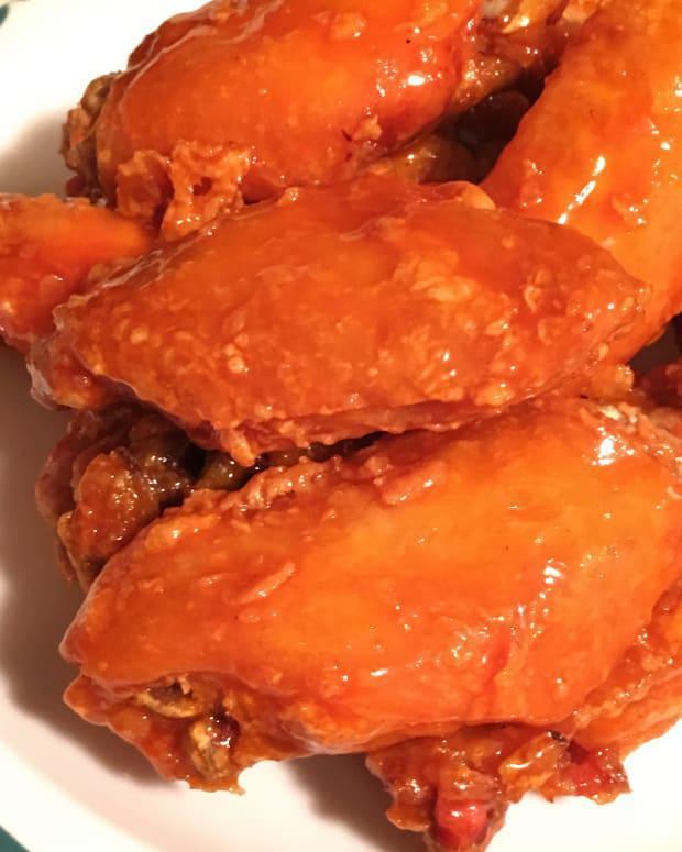 A19. Buffalo Wing · Cooked wing WITH SPICY BUFFALO SAUCE