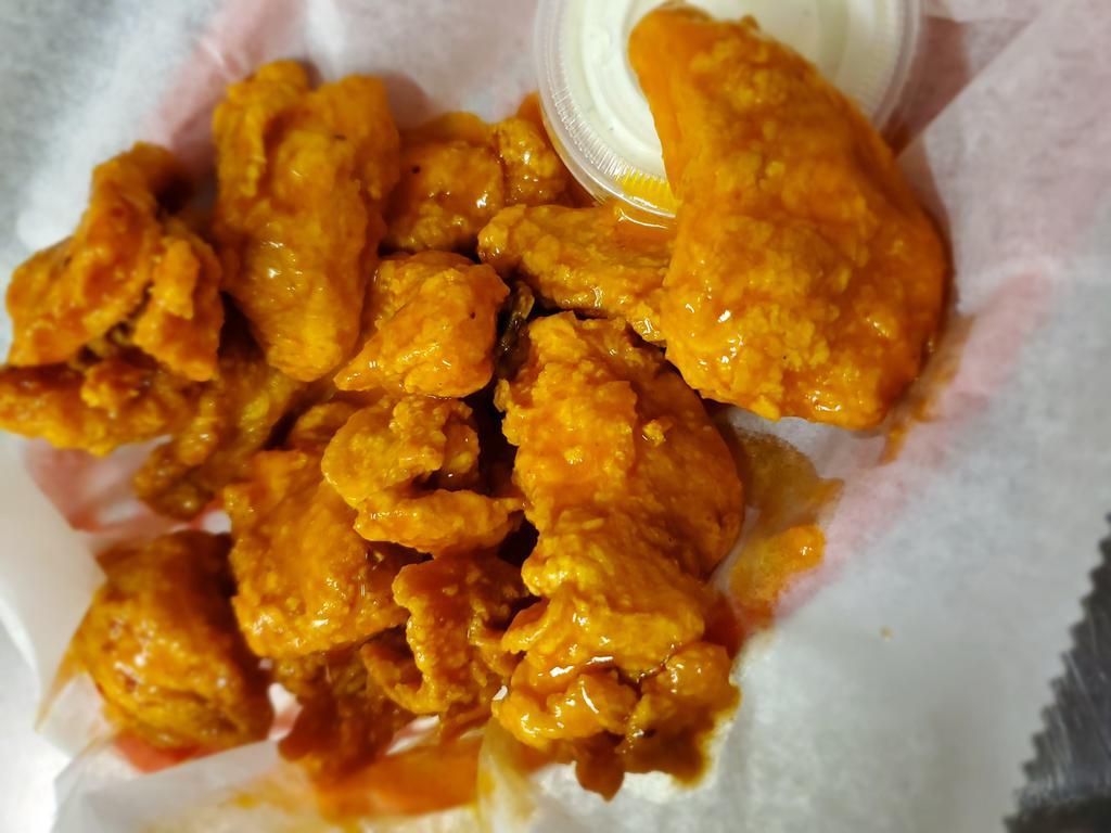 3/4 lb. Boneless Wing · Cooked wing of a chicken coated in sauce or seasoning.