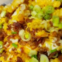 Loaded Fries · Battered fries topped with cheddar, mozzarella and bacon topped with scallions. Add Chili or...