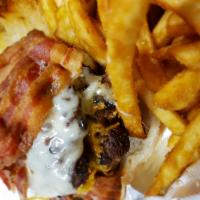 Bacon Double Burger · Two 8 oz. burger patties grilled to your temperature choice topped with cheddar, Swiss and b...
